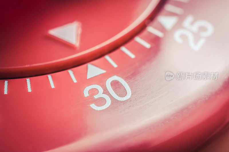 30分钟- Macro Of A Flat Red Kitchen Egg Timer